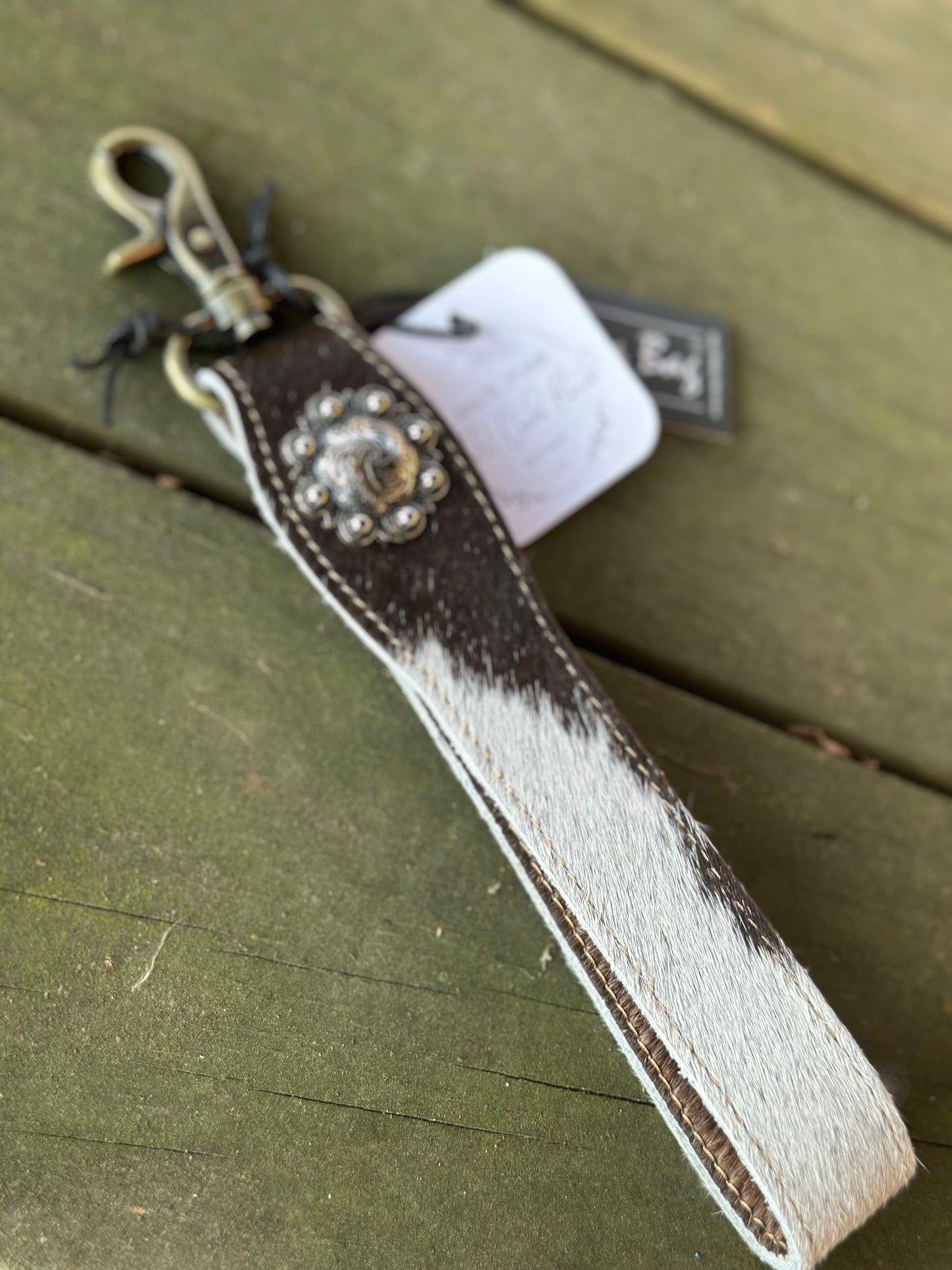 Cow hide strap with button keychain