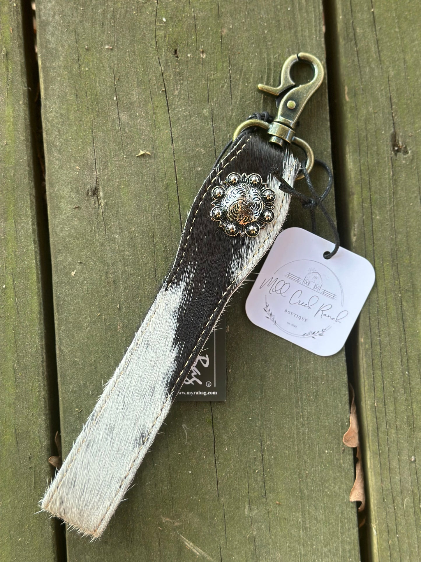 Cow hide strap with button keychain
