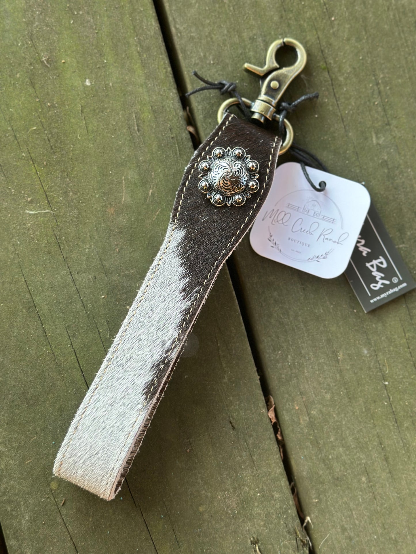 Cow hide strap with button keychain